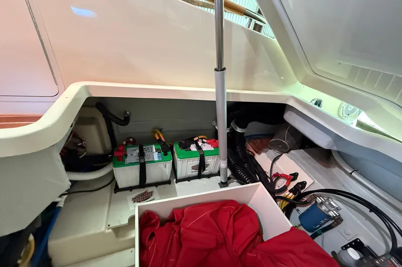 Slide: The Image of 2021 Chris-Craft Launch 31 GT engine compartment with batteries and storage area. - 22