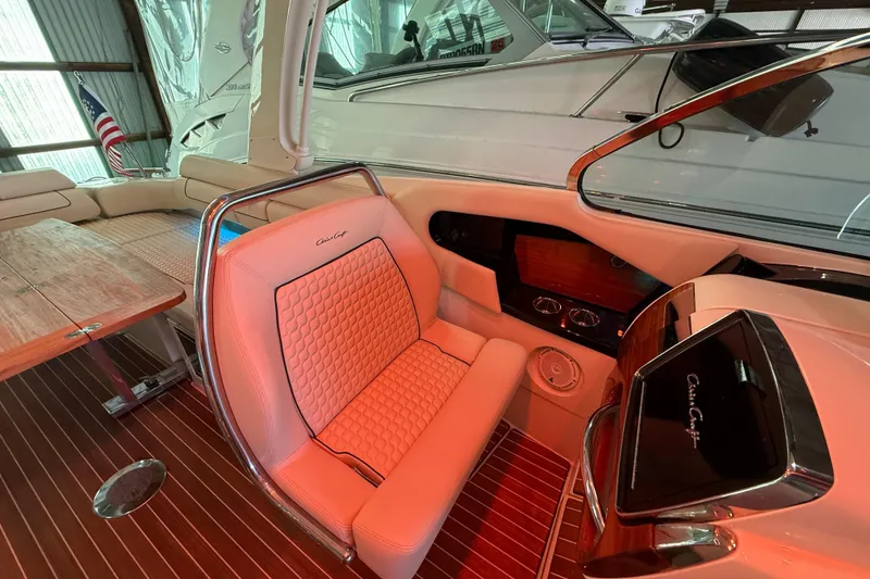 Slide: The Image of 2021 Chris-Craft Launch 31 GT interior with luxurious seating and elegant dashboard design. - 30