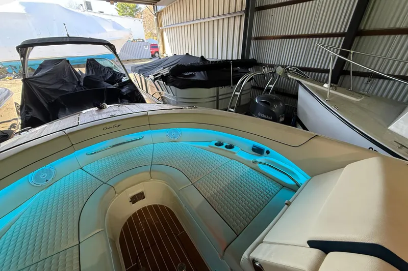 Slide: The Image of 2021 Chris-Craft Launch 31 GT boat interior with blue LED lighting in storage. - 36