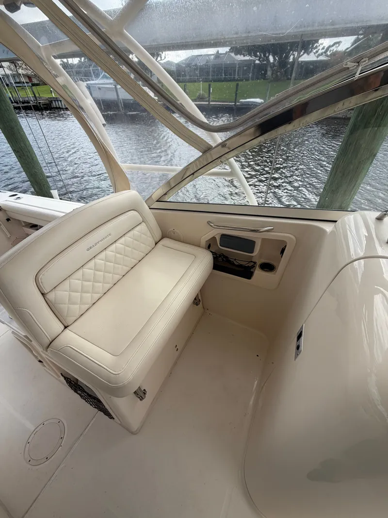 Slide: The Image of Interior of 2019 Grady-White Freedom 307 with sink and storage. - 16
