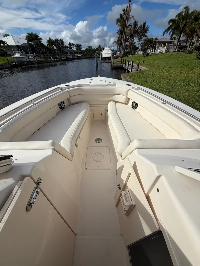 Slide: The Image of Grady-White Freedom 307 helm, 2019 model, featuring Garmin technology. - 23