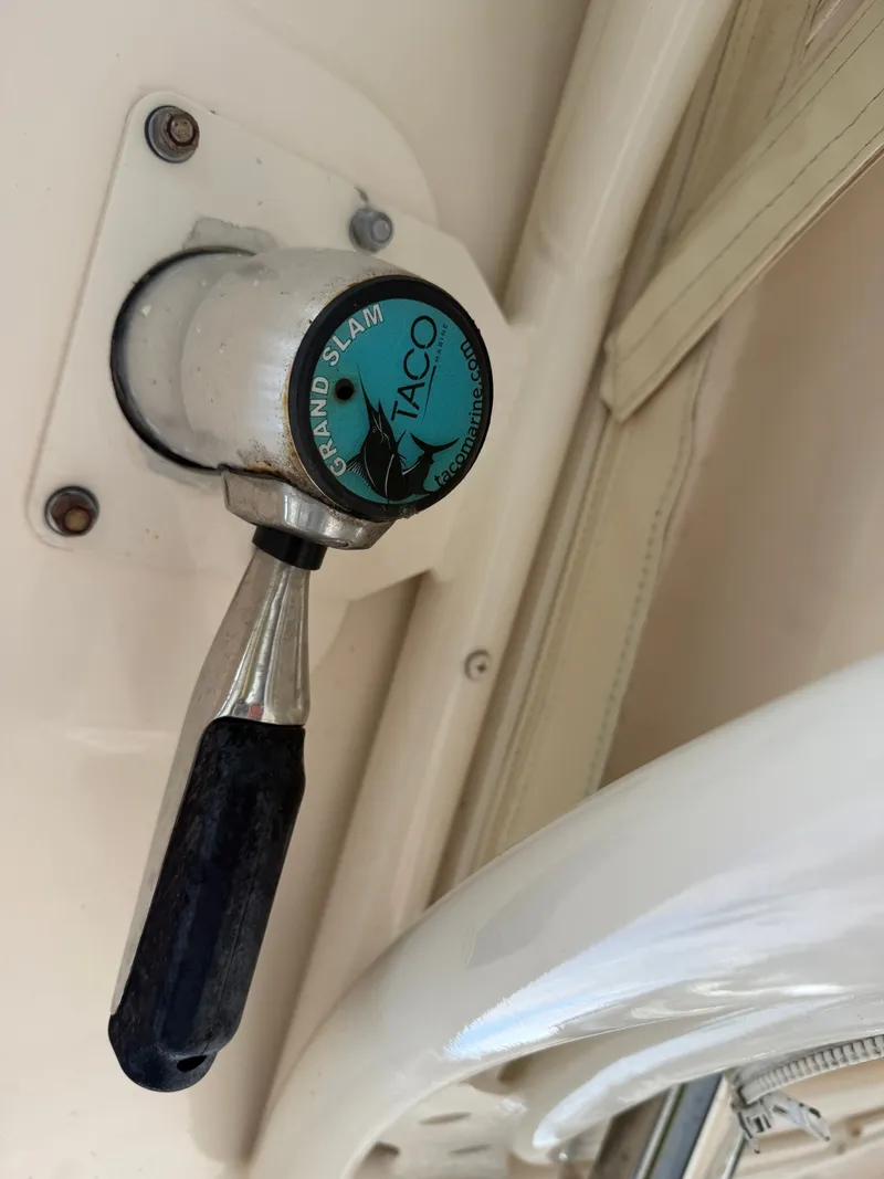 Slide: The Image of 2019 Grady-White Freedom 307 boat docked with Garmin equipment. - 35