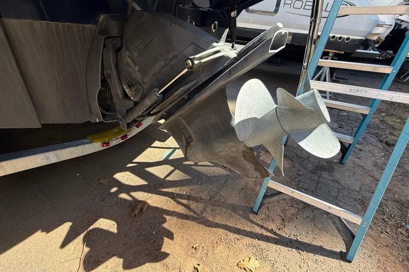Slide: The Image of Close-up of a 2016 Cutwater 24 boat propeller and outdrive on a trailer. - 8