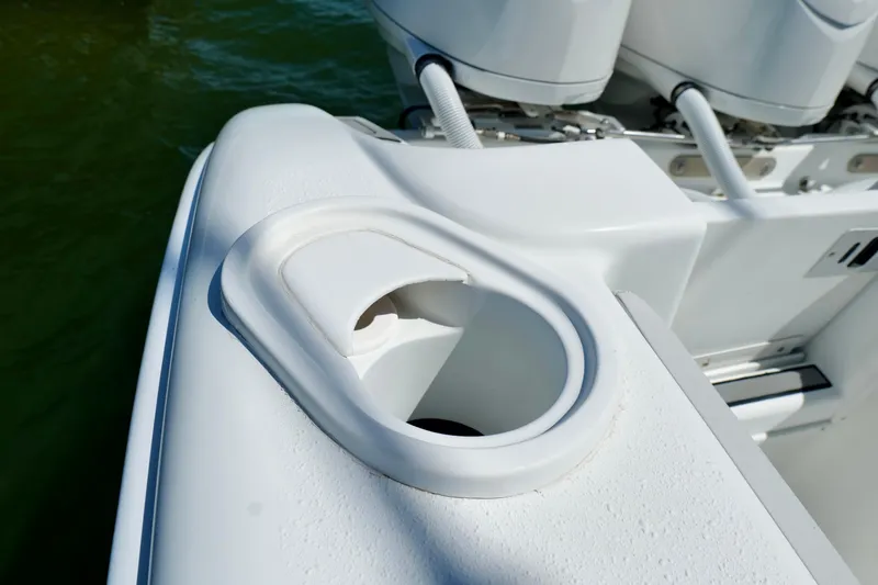 Slide: The Image of Cup holder on 2018 Yellowfin 36 Offshore boat, showcasing sleek design and functionality. - 16