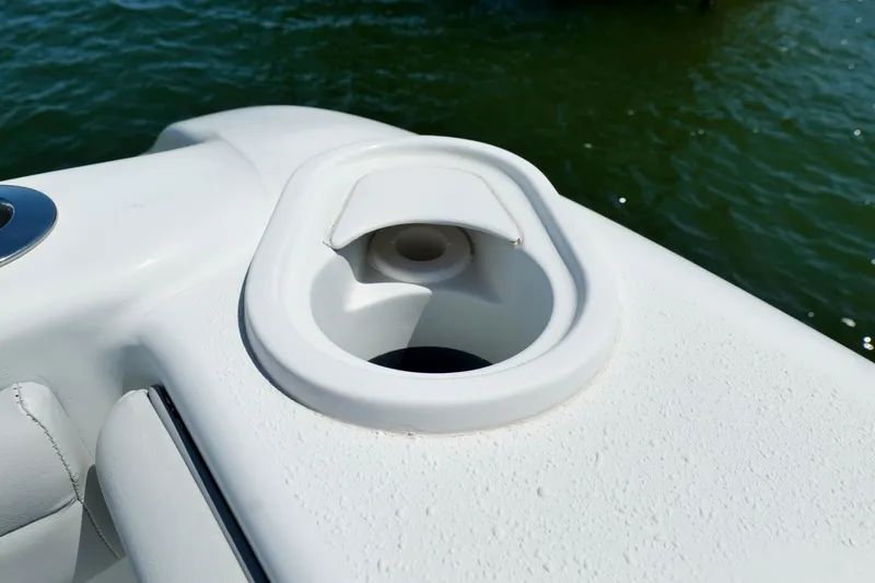 Slide: The Image of Cup holder on a 2018 Yellowfin 36 Offshore boat, near water. - 18