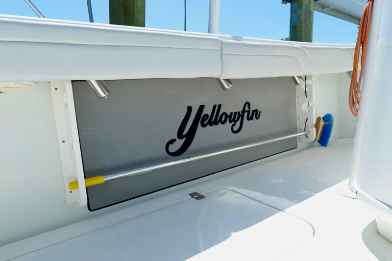 Slide: The Image of 2018 Yellowfin 36 Offshore boat interior with branded storage compartment. - 19