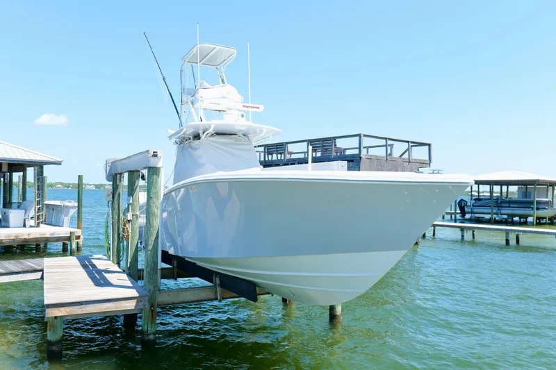 Slide: The Image of 2018 Yellowfin 36 Offshore boat docked on a sunny day. - 6