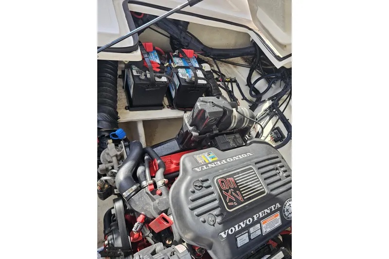 Slide: The Image of Engine compartment of a 2008 Regal 2520 FasDeck with Volvo Penta motor and batteries. - 110
