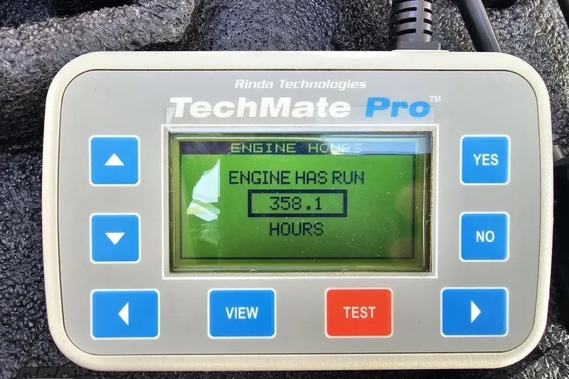 Slide: The Image of TechMate Pro device displaying 358.1 engine hours for 2008 Regal 2520 FasDeck. - 111
