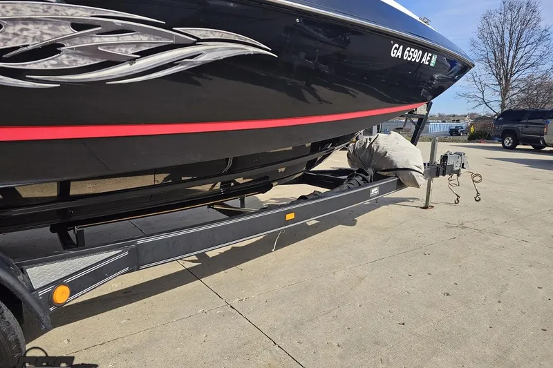 Slide: The Image of 2008 Regal 2520 FasDeck boat on trailer, parked outdoors. - 15