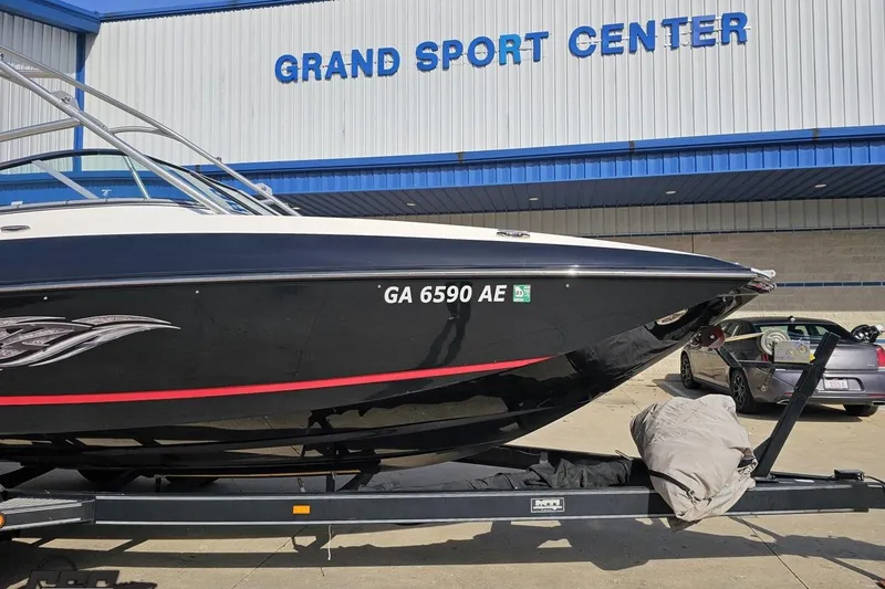Slide: The Image of 2008 Regal 2520 FasDeck boat on trailer at Grand Sport Center. - 16