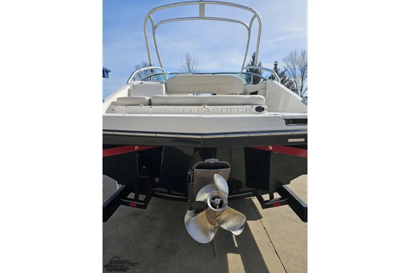 Slide: The Image of 2008 Regal 2520 FasDeck boat rear view with propeller and seating. - 37