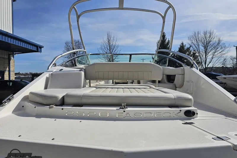 Slide: The Image of 2008 Regal 2520 FasDeck boat with spacious seating and sleek design. - 38