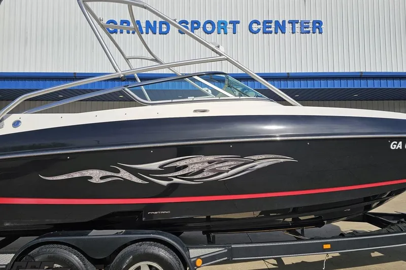 Slide: The Image of 2008 Regal 2520 FasDeck boat with sleek design at Grand Sport Center. - 4