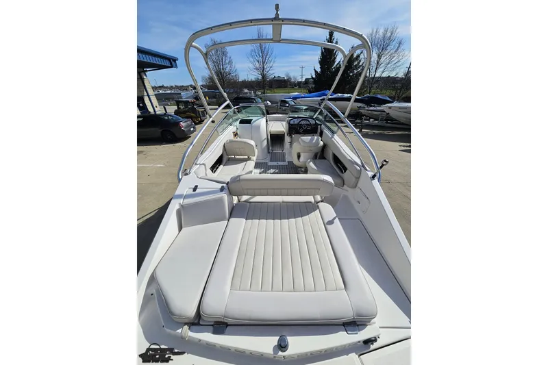Slide: The Image of 2008 Regal 2520 FasDeck boat with spacious seating and sleek design. - 40