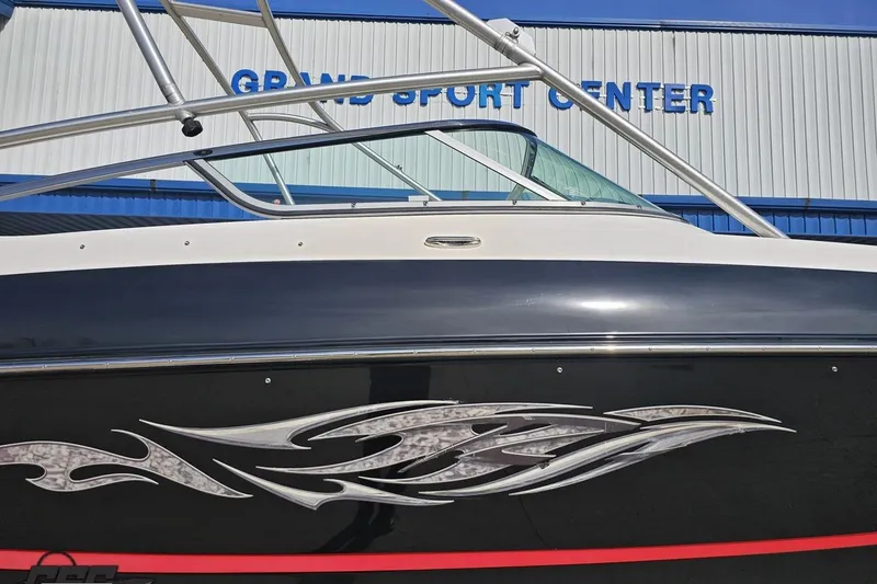 Slide: The Image of 2008 Regal 2520 FasDeck boat with sleek design at Grand Sport Center. - 5