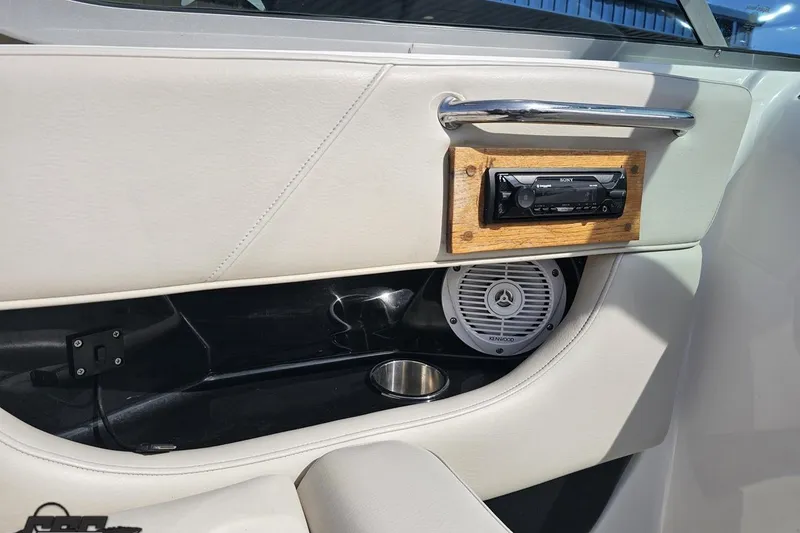 Slide: The Image of Interior of 2008 Regal 2520 FasDeck boat with stereo and speaker system. - 65