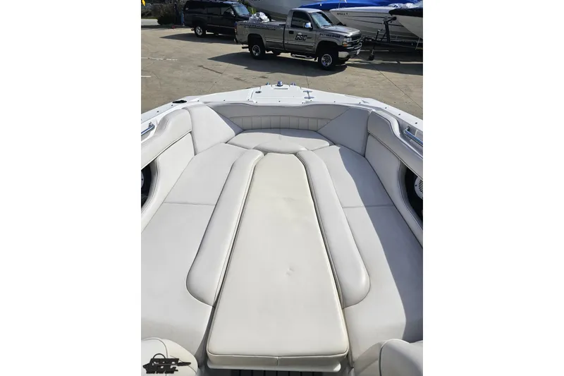 Slide: The Image of 2008 Regal 2520 FasDeck boat interior with spacious white seating area. - 87