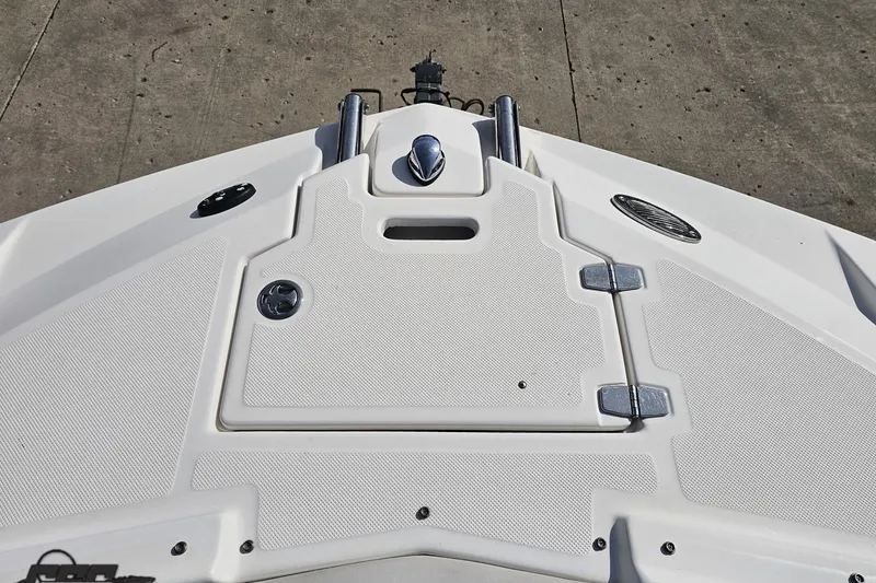 Slide: The Image of Bow of a 2008 Regal 2520 FasDeck boat with anchor storage compartment. - 99