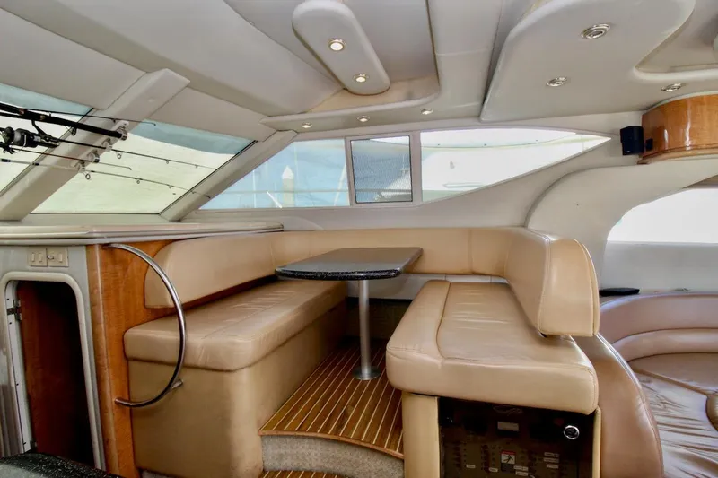 Slide: The Image of Luxurious interior of 2002 Maxum 4600 SCB yacht with leather seating and elegant design. - 13