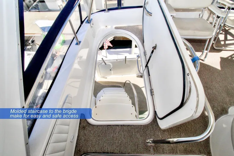 Slide: The Image of 2002 Maxum 4600 SCB Limited Edition yacht with molded staircase to bridge. - 5