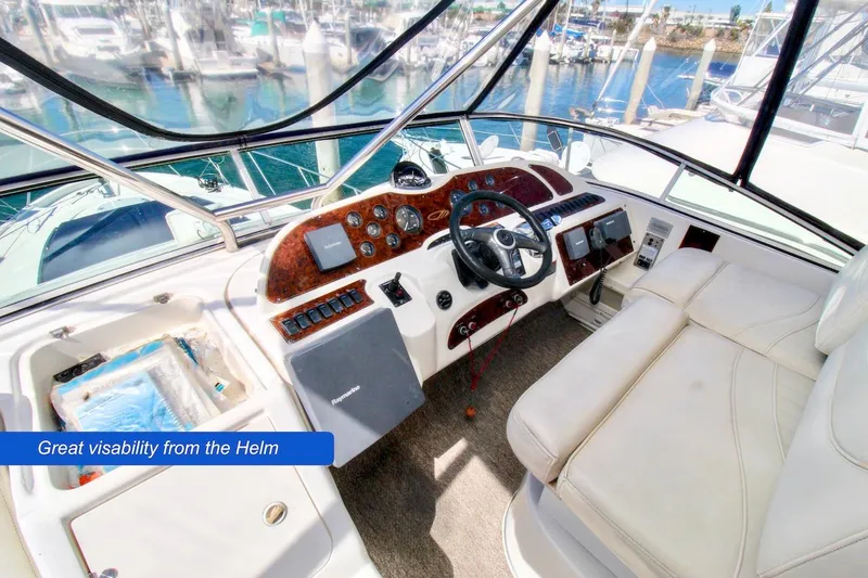 Slide: The Image of 2002 Maxum 4600 SCB Limited Edition helm with panoramic marina view. - 7