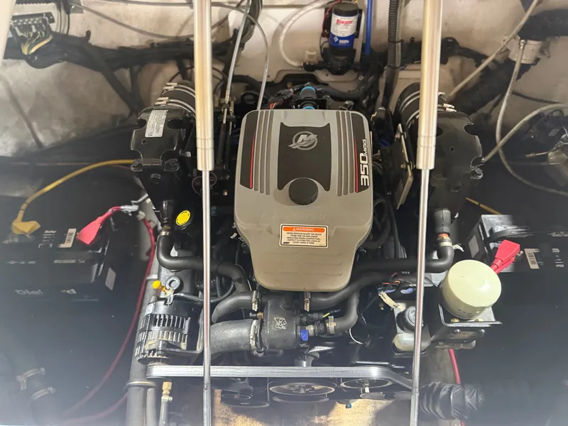 Slide: The Image of Engine compartment of a 2009 Crownline 240 LS boat with 350 MAG engine. - 10