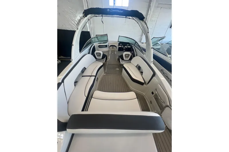 Slide: The Image of 2024 Crownline Eclipse E290 XS boat interior with sleek seating and modern design. - 10