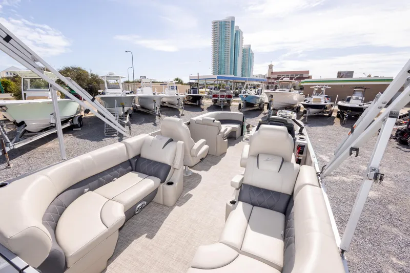 Slide: The Image of 2024 SilverWave 2210 CLS SW5 pontoon boat with Suzuki engine on a trailer. - 12