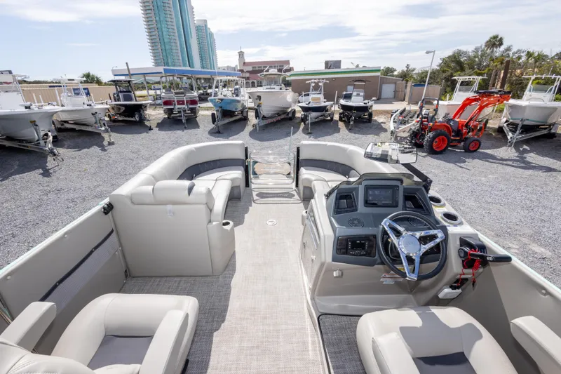 Slide: The Image of 2024 SilverWave 2210 CLS SW5 boat interior with modern dashboard and steering wheel. - 20