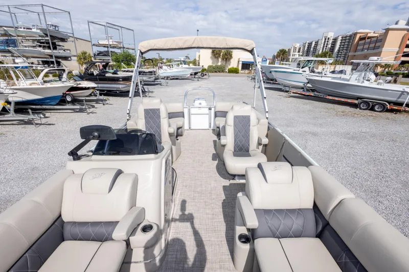 Slide: The Image of 2024 SilverWave 2210 CLS SW5 pontoon boat interior with modern helm and seating. - 21