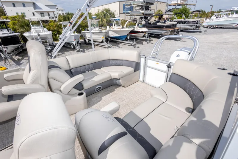 Slide: The Image of 2024 SilverWave 2210 CLS SW5 pontoon boat interior with modern dashboard and seating. - 29