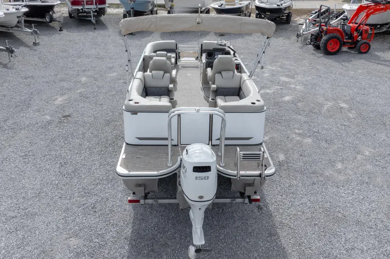 Slide: The Image of 2024 SilverWave 2210 CLS SW5 pontoon boat with Suzuki outboard motor on trailer. - 33