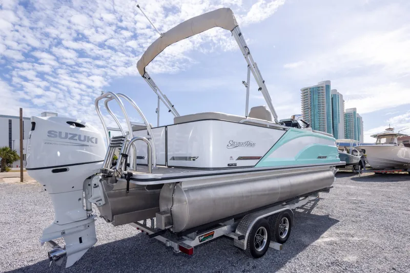 Slide: The Image of Largest pre-owned boat lot, Orange Beach Boat & Yacht Sales, offering thorough inspections and financing. - 5