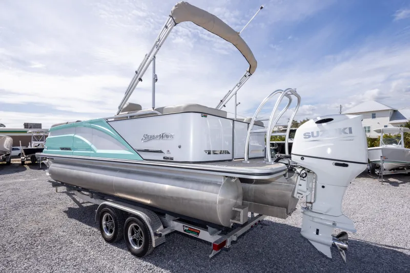 Slide: The Image of 2024 SilverWave 2210 CLS SW5 pontoon boat with Suzuki outboard motor on trailer. - 8