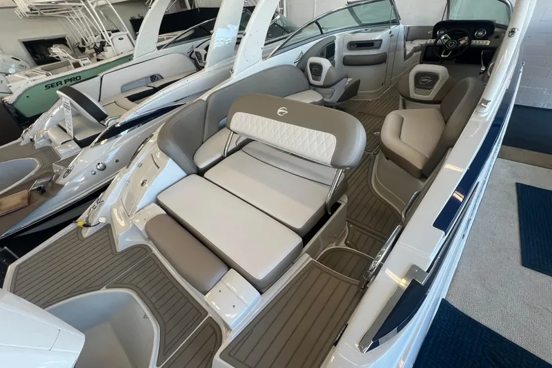 Slide: The Image of 2024 Crownline Eclipse E280 XS boat interior with luxurious seating and modern design. - 17