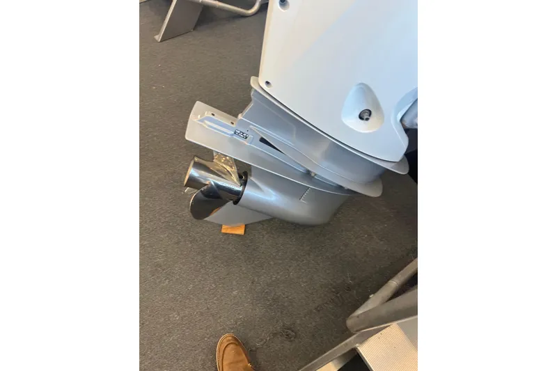 Slide: The Image of 2024 Crownline Eclipse E280 XS boat engine detail on display. - 19