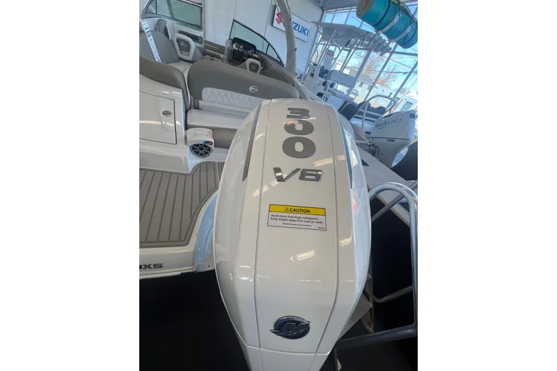 Slide: The Image of 2024 Crownline Eclipse E280 XS boat with 300 V6 engine in showroom. - 6