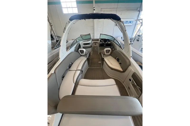 Slide: The Image of 2024 Crownline Eclipse E280 XS boat interior with luxurious seating and modern design. - 7