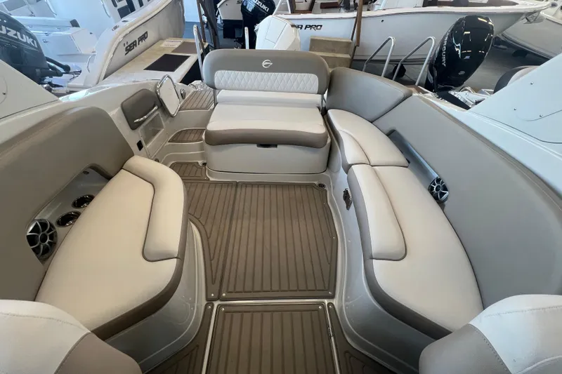 Slide: The Image of 2024 Crownline Eclipse E280 XS boat interior with spacious seating and modern design. - 8