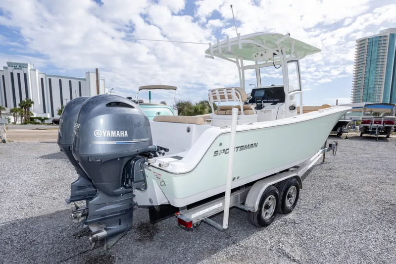 Slide: The Image of 2019 Sportsman Heritage 251 Center Console boat with Yamaha engine on trailer. - 14