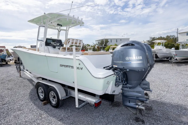 Slide: The Image of 2019 Sportsman Heritage 251 Center Console boat with Yamaha engine on trailer. - 16