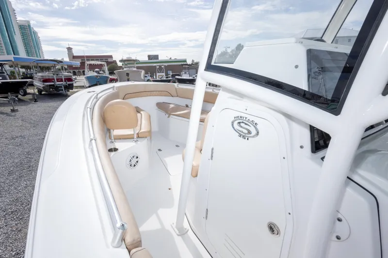 Slide: The Image of 2019 Sportsman Heritage 251 Center Console boat, featuring spacious seating and sleek design. - 30
