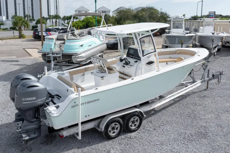 Slide: The Image of 2019 Sportsman Heritage 251 Center Console boat on trailer with Yamaha engines. - 9