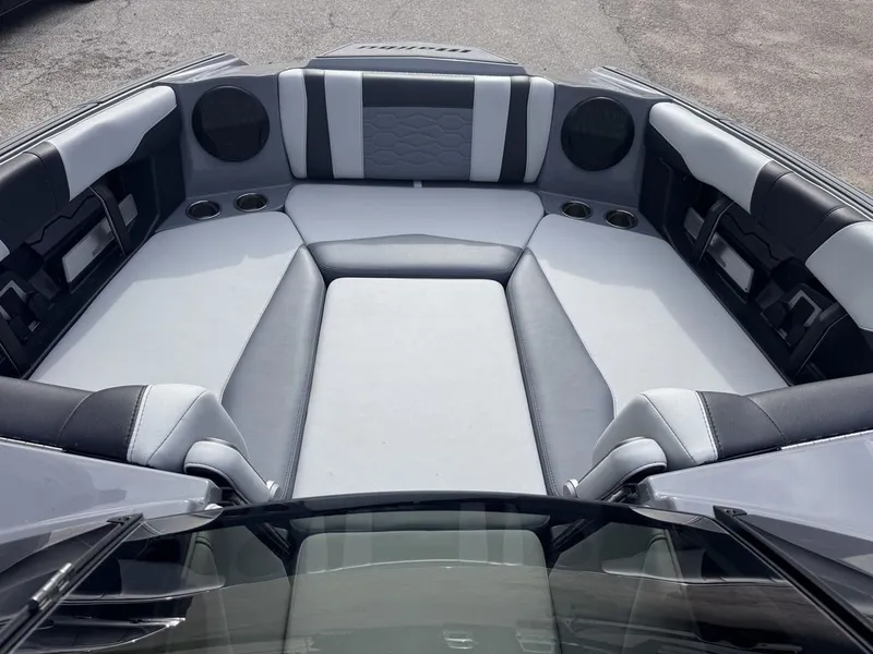 Slide: The Image of Interior of 2024 Malibu Wakesetter 23 MXZ with luxurious seating. - 12