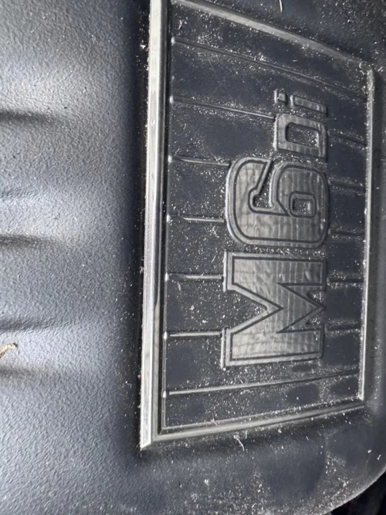 Slide: The Image of Close-up of M6Di emblem on 2024 Malibu Wakesetter 23 MXZ. - 19