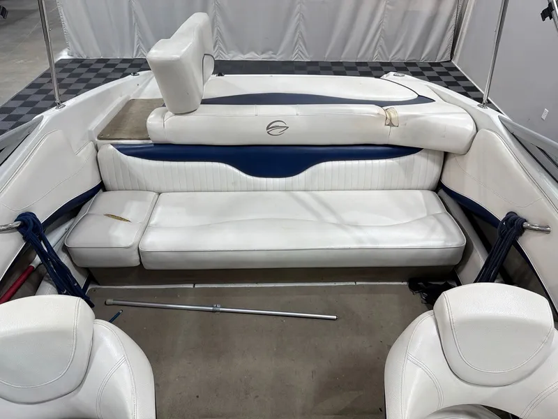 Slide: The Image of Interior of a 2011 Crownline 21 SS boat with white seating. - 10