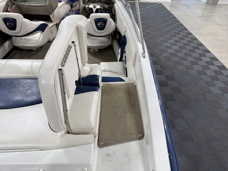 Slide: The Image of Interior of a 2011 Crownline 21 SS boat with white seating. - 7