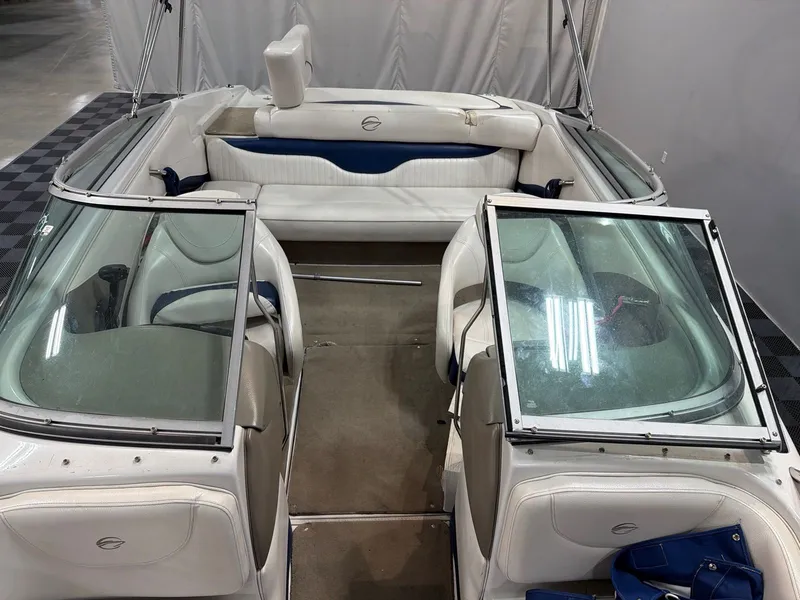 Slide: The Image of Interior of a 2011 Crownline 21 SS boat with white seating. - 9