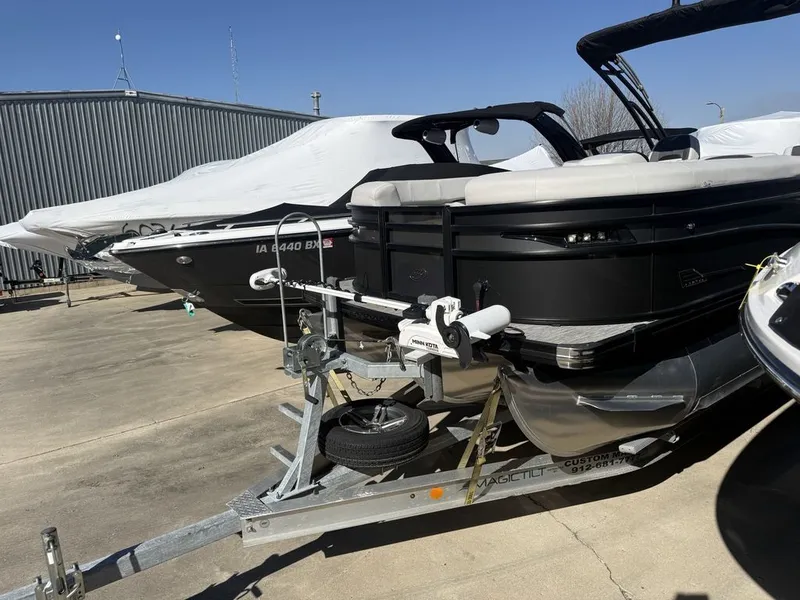 The Image of 2023 Barletta Boats 25U parked on trailer outdoors. - 0